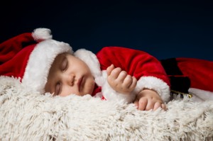 Baby dressed as Santa