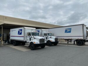 USPS Distribution Center as they transport boxes of photos to be scanned and returned